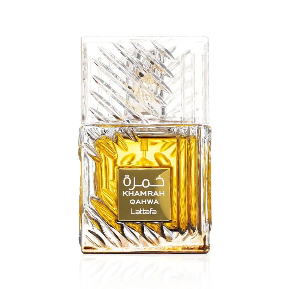 Perfume bottle with gold liquid and 'Khamrah Qahwa' branding on a white background