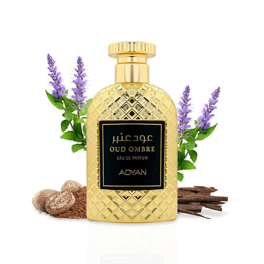 Gold bottle of Oud Ombre perfume by Adyan with lavender and vanilla beans on a white background