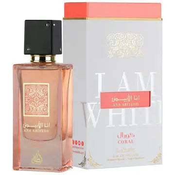Lattafa Ana Abiyedh Coral EDP bottle with pink juice & gold accents