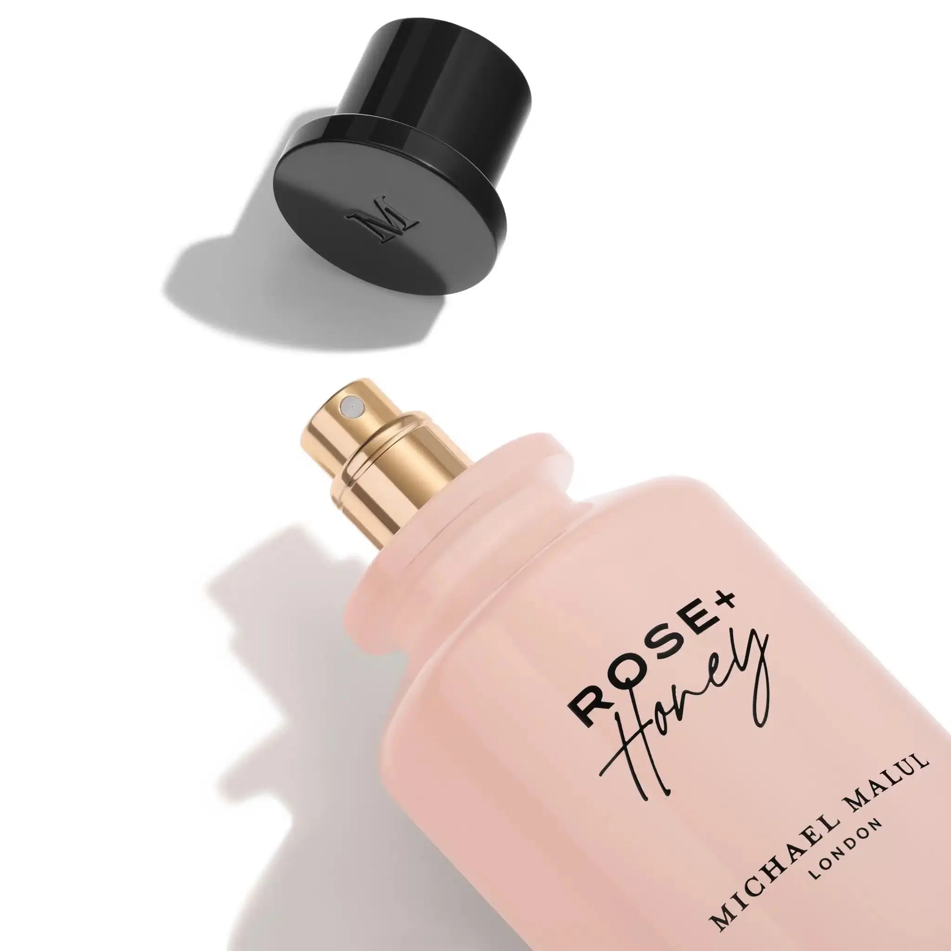 Rosehoney perfume bottle with honeycomb-inspired design details