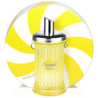 Yellow perfume bottle with silver cap labeled 'Sugarful Sunshine' by Michel Germain on a yellow and white striped background.