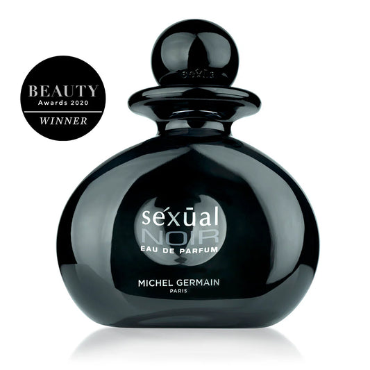 Black perfume bottle labeled 'Sexual Noir' by Michel Germain on a white background with a Beauty Awards 2020 winner badge.