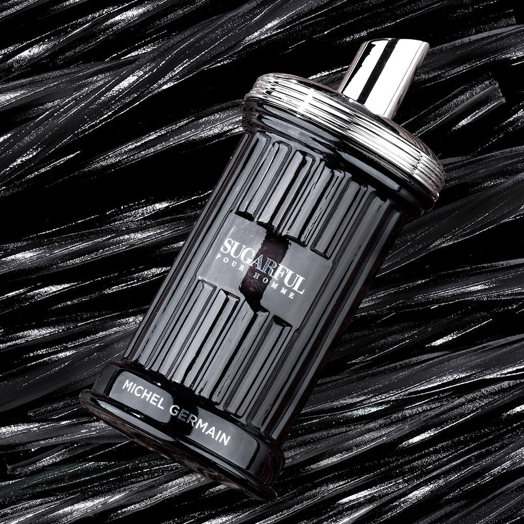 Sugarful Pour Homme men’s cologne bottle on black licorice background